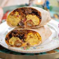 Steak And Black Bean Breakfast Wrap · scrambled eggs, tater tots, jack cheese, steak, rice, black beans, large flour tortilla, sal...