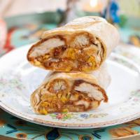 Fried Chicken And Gravy Wrap · flour tortilla rolled up + stuffed with fried chicken, mozzarella cheese, tots, corn, brown ...