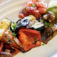 Vegetales A La Parrilla · Grilled zucchini, eggplant, mushroom, onion, red & green bell peppers.