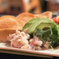 Ceviche · Tender shrimp and white fish, mango and cucumber served with avocado and pico de gallo garni...