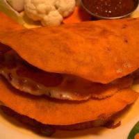 Quesadilla · Pork belly, chicharrones, Oaxaca, ancho chili tortilla. Or beef birria, onion, puya salsa, o...