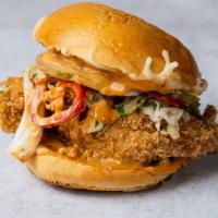 Birdies Spicy W/Cheese · Fried chicken breast sandwich with Fresno peppers, coleslaw, ghost pepper mayo, pepper jack ...