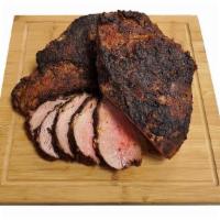 Grilled Tri Tip · Grilled tri-tip sold whole, dinner sliced or thin sliced. By the lb.
