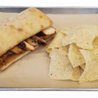 Grilled Chicken Sandwich · Ciabatta roll, grilled chicken, tortilla chips. Dry.