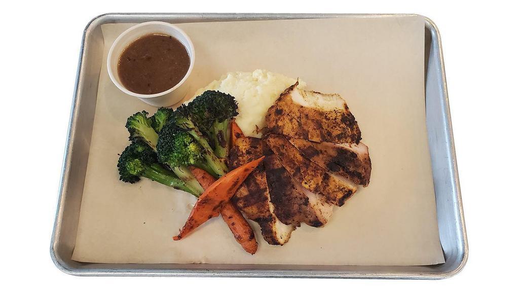 Grilled Chicken Dinner Platter · Grilled chicken, garlic herb butter, Yukon gold mashed potatoes, charred broccoli & carrots, au jus sauce (on the side).