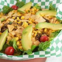 Fiesta Taco Salad · Crisp Romaine lettuce, corn kernels, black beans, tomatoes, cilantro, avocado, Cheddar chees...