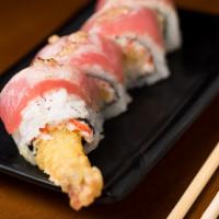 Firebird · Shrimp tempura, asparagus and crab meat topped w/ seared tuna and garlic sauce.