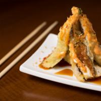 Howie · Deep-fried roll with spicy tuna, cream cheese and spicy house sauce.