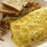 Veggie Omelet · With cheddar cheese, hashbrowns, and toast. Onions, peppers, zucchini, and tomatoes.