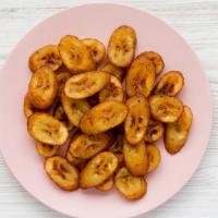 Sweet Plantains · Sweet, ripe plantains fried until golden and crisp on the outside.