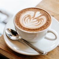 Café Mocha · Steamed milk, dark espresso with rich chocolate.