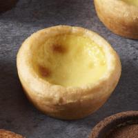 Egg Tart · Tart shell, egg, milk. 

Contains: Coconut, Egg, Milk, Wheat