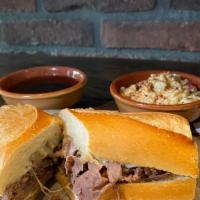 French Dip Sandwich · 6 oz of tender roast beef, sliced thin and piled high on a 6