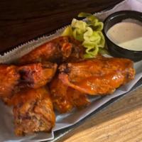 Wings · 6 Piece wings with choice of Buffalo, BBQ, or Habenero Repasado red sauce