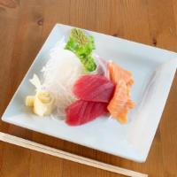 6 Pieces Sashimi Platter · 2 pieces tuna, 2 pieces salmon, 2 pieces yellowtail sashimi.