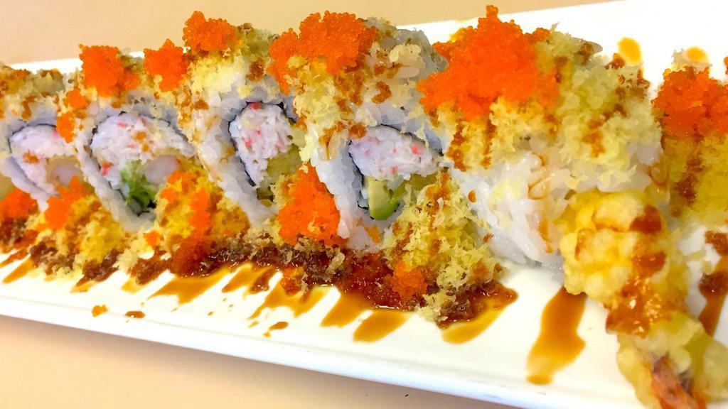 Crunchy Roll · Shrimp tempura, imitation crab, avocado topped with tempura flake, masago and eel sauce. All rolls come with avocado, sushi rice and seaweed paper