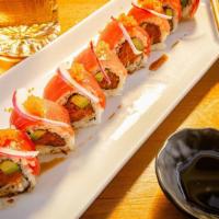Cherry Blossom Roll · Spicy tuna roll with tuna sashimi, masago and red onion on top drizzled with spicy ponzu sau...