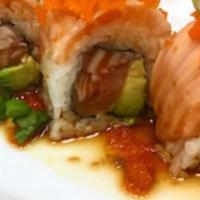 Salmon Lovers Roll · Salmon avocado roll with seared salmon sashimi, masago, green onion and garlic ponzu sauce o...