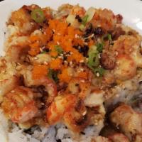 Baby Lobster Roll · In: crabmeat, avocado; Out: baked crawfish, green onions, smelt eggs, sesame seeds; Sauce: b...