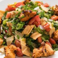 Greek Salad · Vegetarian. Romaine lettuce, tomatoes, onions, greek dressing topped with feta cheese and Ka...