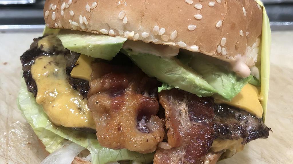 Double Bacon Cheeseburger · Double servings of our delicious 1/4 Burger Patties, 2 slices cheese, Bacon, Lettuce, tomatoes, onion, pickles and 1000 island dressing