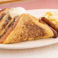French Toast Breakfast Special · French toast topped with Powdered sugar, served with 2 Eggs any style and choice of 2 bacon ...