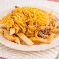 Cheese Fries · Crispy French fries, topped with melted American cheese.