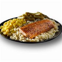 Grilled Salmon Meal · One piece grilled salmon served on a bed of rice with two sides.