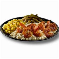Grilled Shrimp Meal · Eight pieces grilled shrimp served on a bed of rice with two sides.