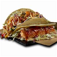 2 Tacos · Customize your tacos with your choice of grilled salmon or grilled shrimp and one of our sig...