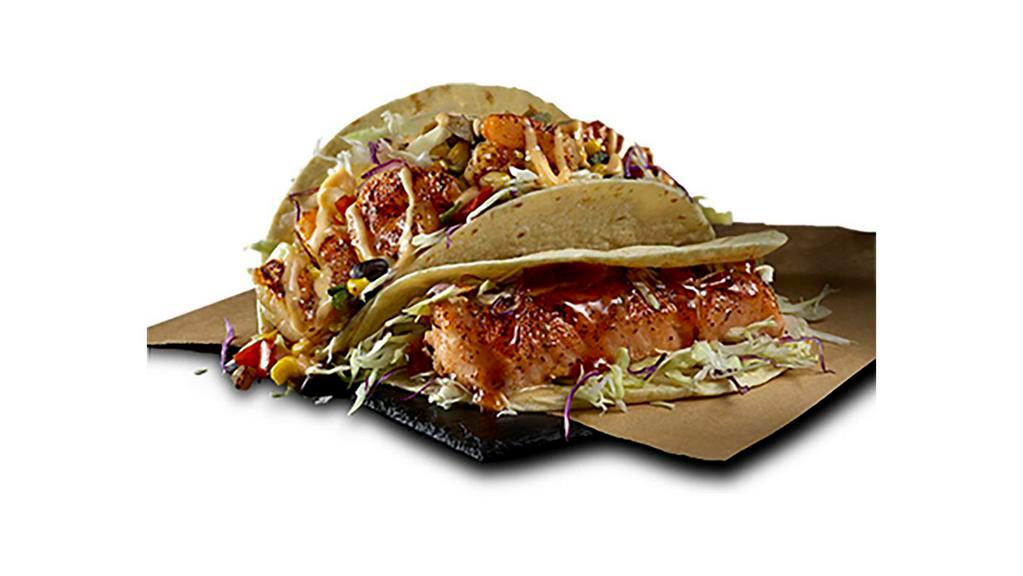 2 Tacos · Customize your tacos with your choice of grilled salmon or grilled shrimp and one of our signature toppings.