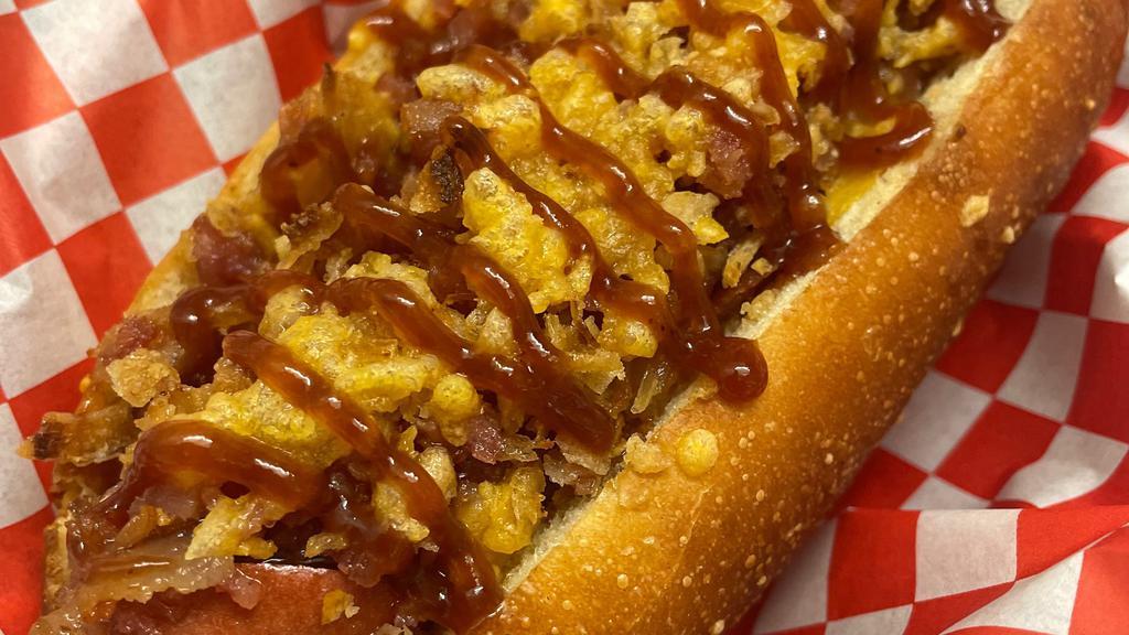 Western Dog · Angus hotdog topped with BBQ sauce, bacon, shredded cheese and crispy onion strips.