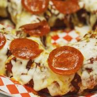 Pizza Pretzel · Large  Pretzel topped with Pizza sauce, Mozzarella cheese, pepperoni and Italian seasoning