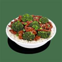 Beef And Broccoli · Grass-fed wok seared steak, garlic, ginger, scallions and broccoli. Tossed in a rich and swe...