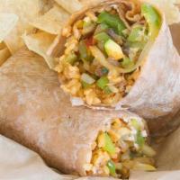 Vegetarian Burrito · Sauteed pepper, onions, zuchini and mushrooms with rice and Mexican cheese in a whole wheat ...