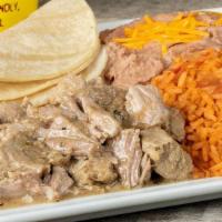 Combo#5 Dinner Plate · Marinated chile verde pork served with tortillas.