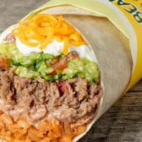 Garbage, Shredded Beef · Refried beans, Spanish rice, cheddar cheese, lettuce, tomatoes, fresh homemade creamy guacam...