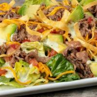 Taco Salad, Shredded Beef · Fresh avocado, mixed greens, refried beans, cheddar cheese, tomatoes, crisp tortilla strips,...