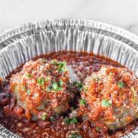 Meatballs  · Homemade Meatballs served with homemade Marinara sauce and topped with parmesan cheese and p...
