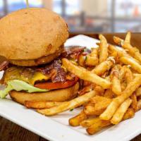 Barbecue Bacon Cheeseburger · Grilled angus beef with homemade BBQ sauce, cheddar cheese, green leaf, tomato, caramelized ...