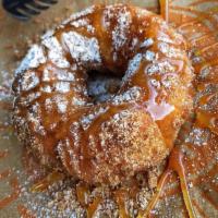 Single Churro Donut · Perfectly crispy on the outside, warm and soft on the inside. The combination of both make f...