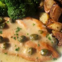 Chicken Piccata · Lemon caper sauce with two sides.