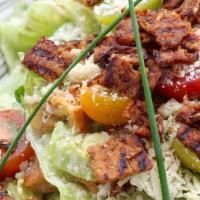 Creamy Vegan Caesar Salad · Baby romaine/ heirloom cherry tomatoes / tempeh bacon / homemade croutons