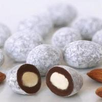 Candies Toffee Almonds · Roasted almonds covered with rich butter toffee and milk chocolate, dusted with confectioner...