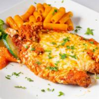 Pollo Parmigiana · Baked breaded chicken breast with parmesan and mozzarella cheese in a light tomato sauce.