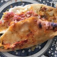 Ground Beef Hard Taco · Fried corn tortillas served with beef, lettuce and cheese.