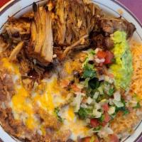 Carnitas Combination Dinner · A house favorite! Slow cooked pulled pork served with onions, cilantro and limes on the side...