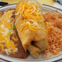 Chimichanga · Meat, beans and rice stuffed into super large flour tortilla then deep-fried to give an extr...