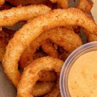 Onion Rings · Panko, crusted onion rings seasoned in our OG seasoning blend of spices. Comes with a side h...