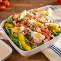 Spinach Salad · Spinach, bacon, gorgonzola cheese, eggs, tomatoes, and red onions.